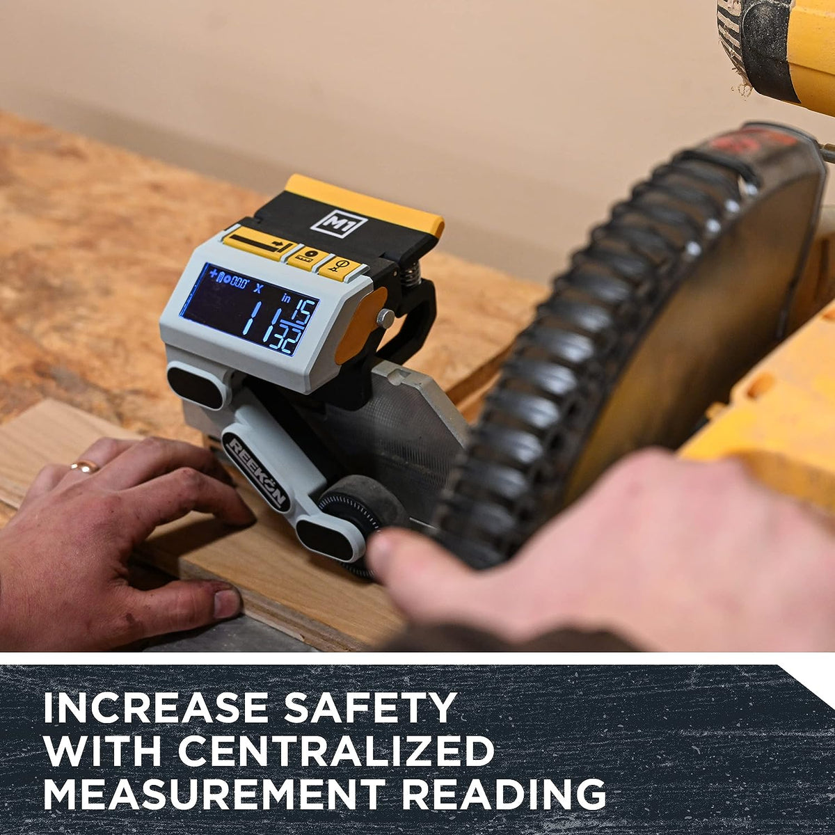REEKON M1 Caliber digital miter saw measuring tool in use on a jobsite